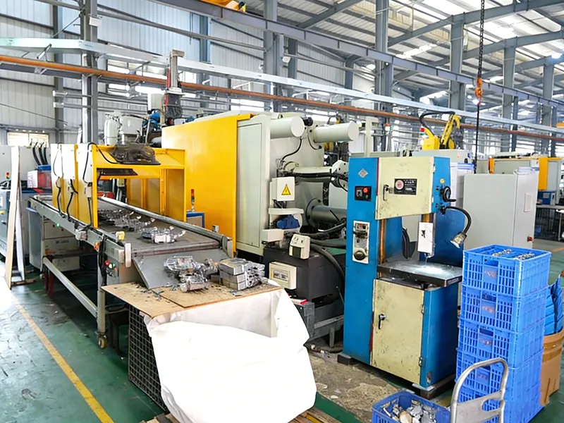 An industrial die casting machine producing automotive aluminum parts (1)