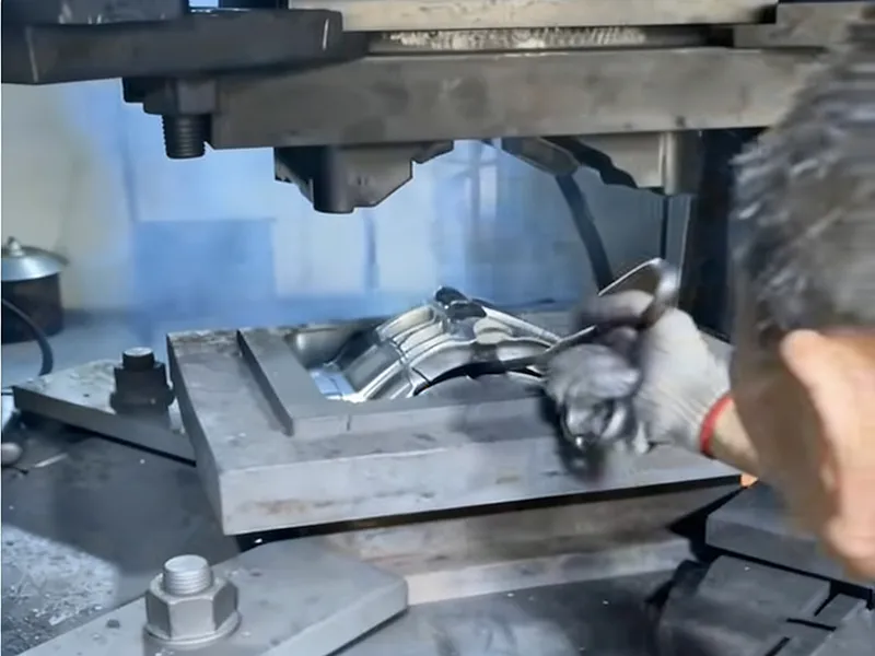 Skilled Operator Works on Aluminum Mold Tooling with Machine