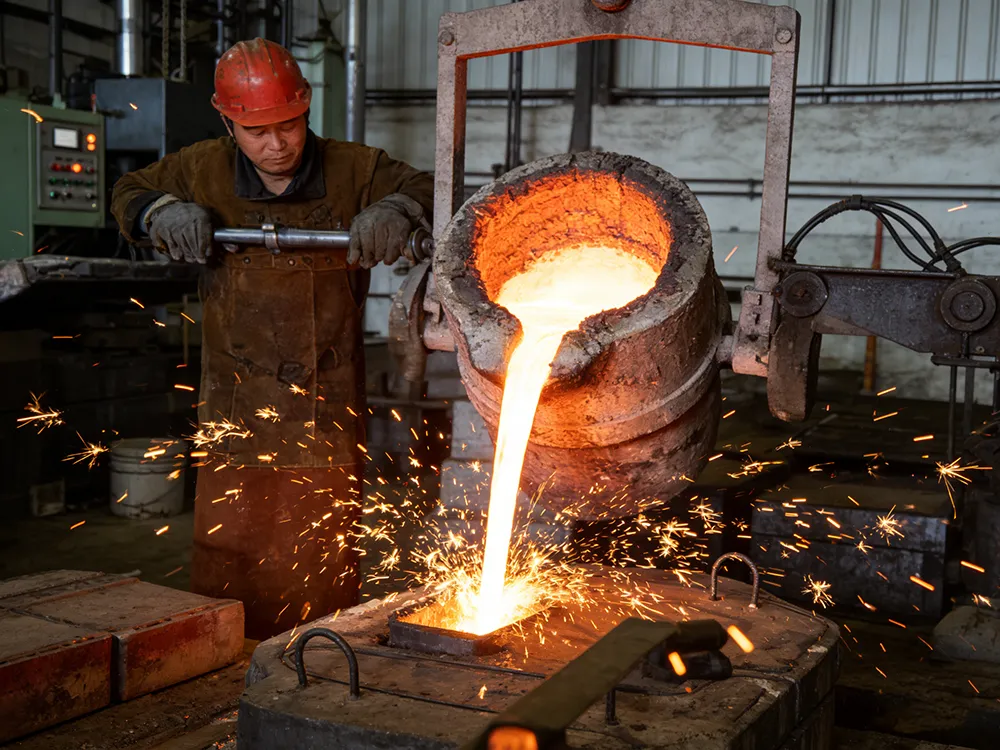 molten brass pouring process showing brass melting point in industrial casting