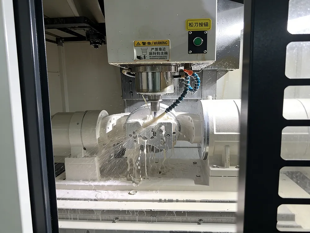 Five axis CNC machining process manufacturing a high precision metal component