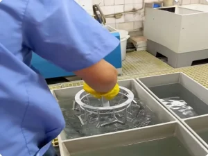 Metal parts in chemical surface finishing process with immersion treatment to enhance corrosion resistance