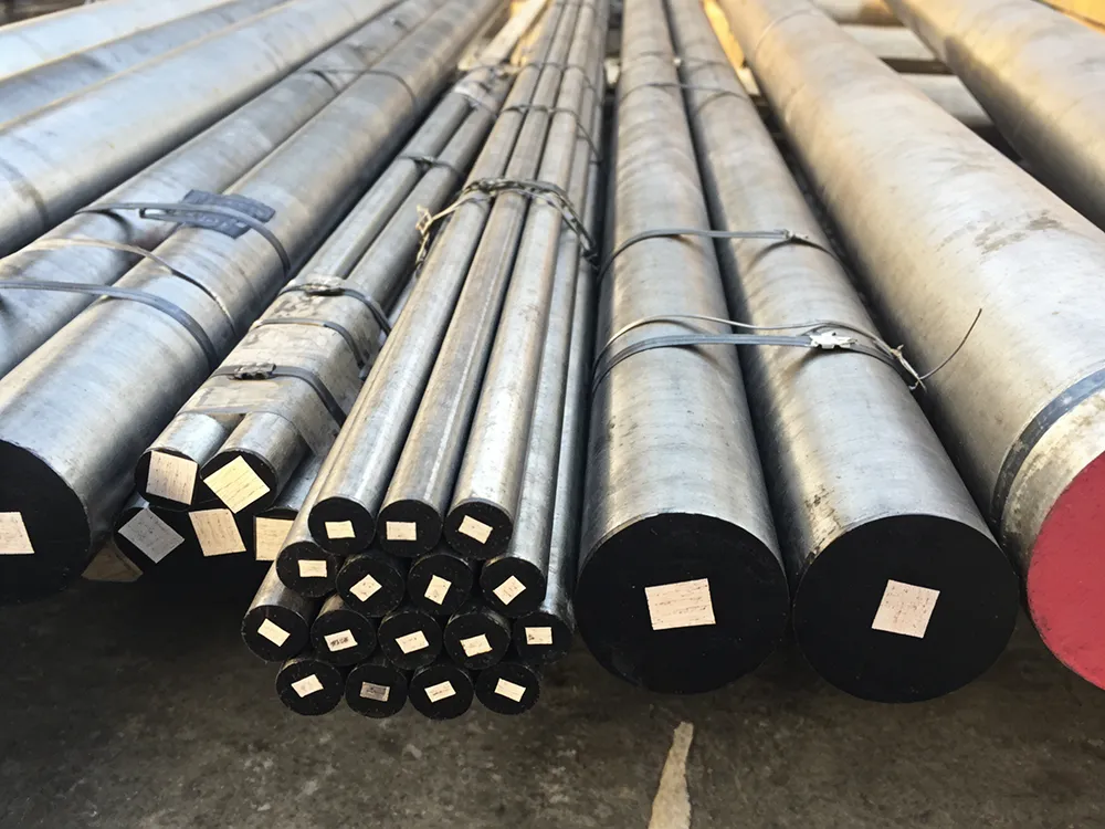 Stacked tool steel bars in warehouse showing different sizes and industrial supply