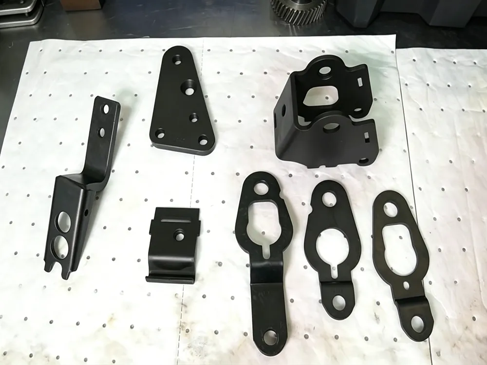 Finished CNC components with black oxide coating and uniform blackening coating surface