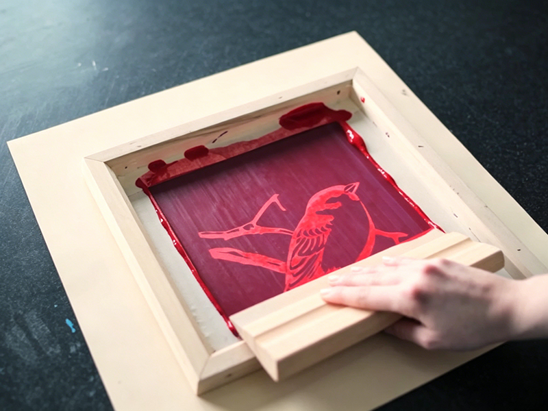 Preparing a screen printing stencil with emulsion on a wooden frame