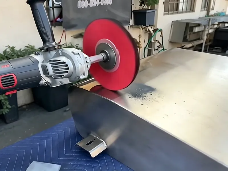 Stainless Steel Polishing process using a buffing wheel on a metal surface